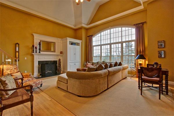 6 Chadwick Way Hopkinton, MA 01748 - Photo 8 of 30 a living room with furniture a fireplace and a flat screen tv