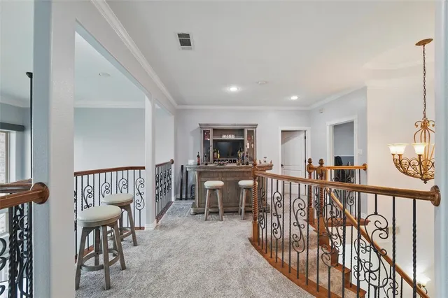 a view of a livingroom with furniture and windows