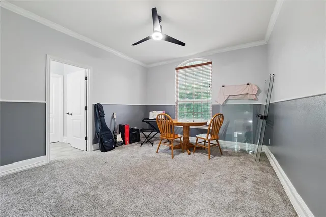a view of a livingroom with furniture and a window