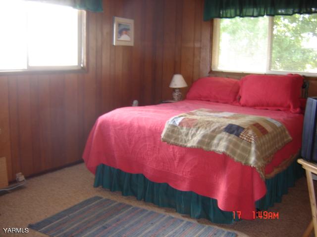 5711 Lateral A Road Wapato, WA 98951 - Photo 12 of 16 a bedroom with a bed and a window