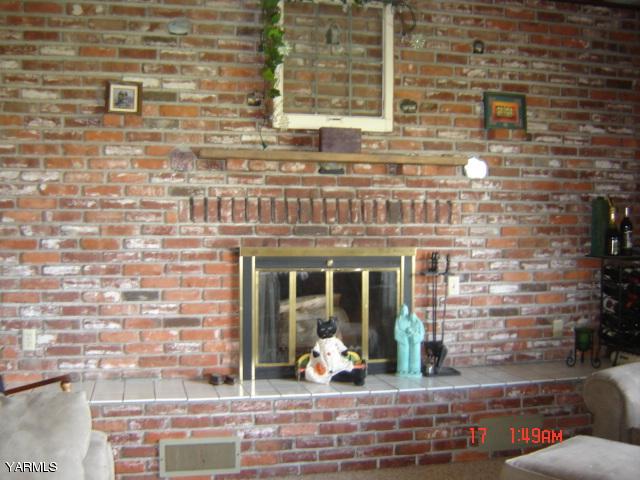 5711 Lateral A Road Wapato, WA 98951 - Photo 5 of 16 a living room filled with furniture