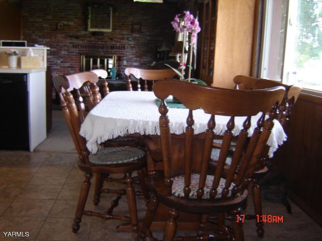 5711 Lateral A Road Wapato, WA 98951 - Photo 6 of 16 a view of a dining room with furniture and window
