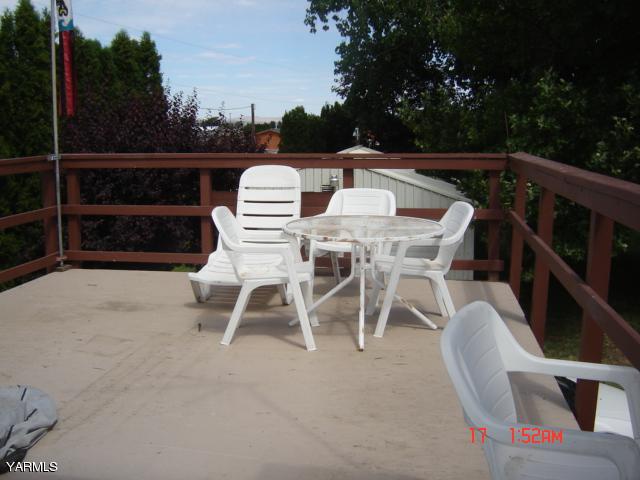 5711 Lateral A Road Wapato, WA 98951 - Photo 10 of 16 a view of a chairs and table in the back yard