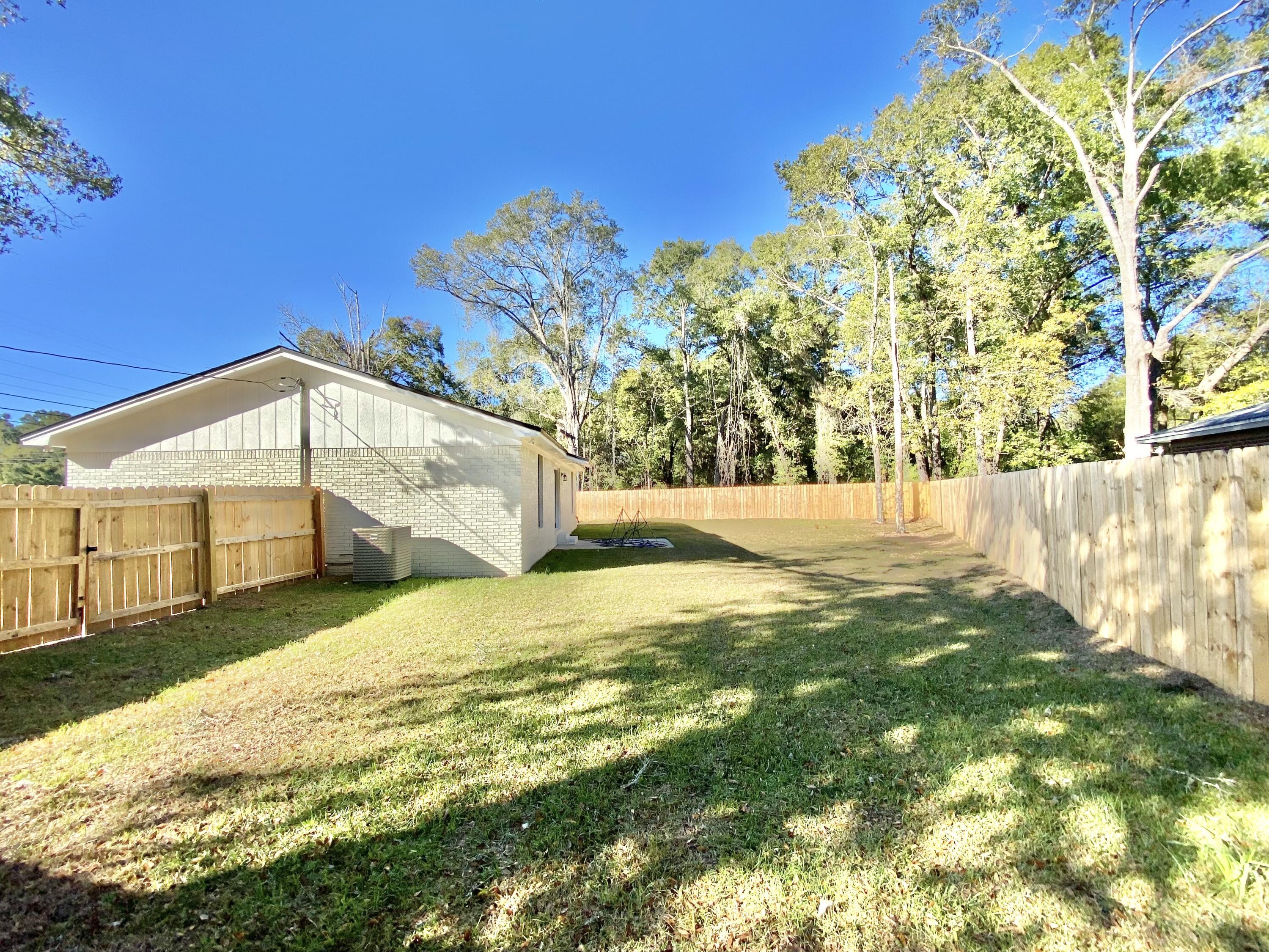 795 Bay Street Crestview, FL 32536 - Photo 29 of 34 a bathroom with a sink and yard