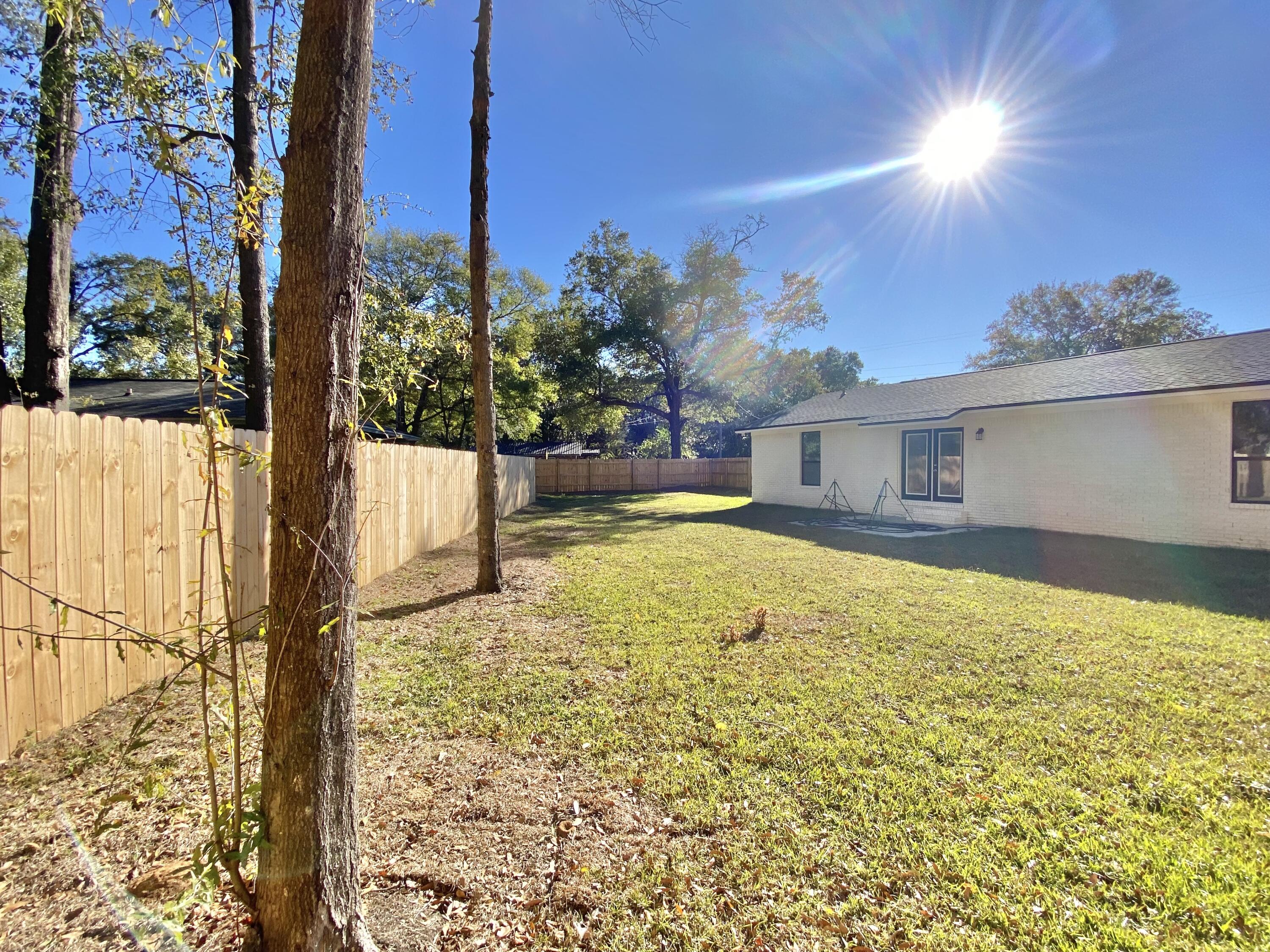 795 Bay Street Crestview, FL 32536 - Photo 33 of 34 a house view with a swimming pool