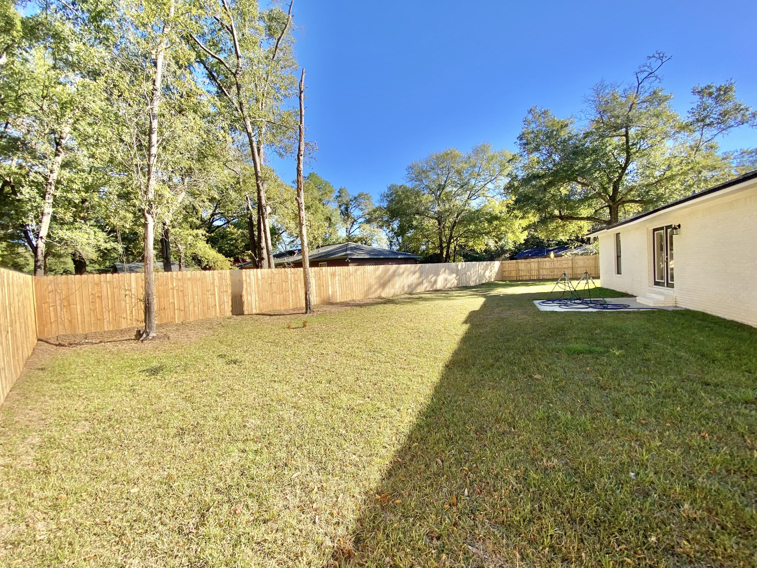 795 Bay Street Crestview, FL 32536 - Photo 34 of 34 a view of an outdoor space and swimming pool