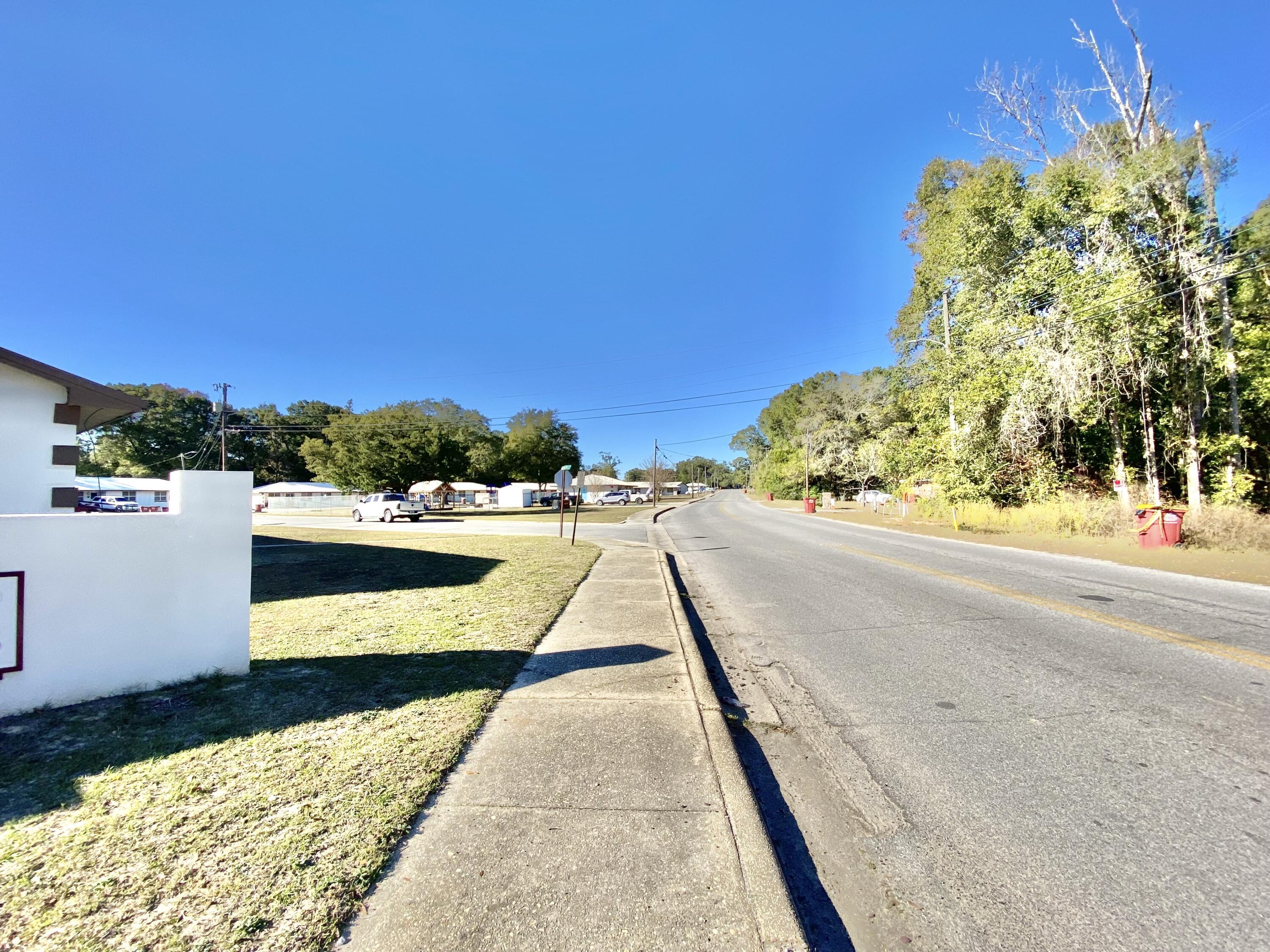 795 Bay Street Crestview, FL 32536 - Photo 5 of 34 a view of swimming pool with a lounge chair