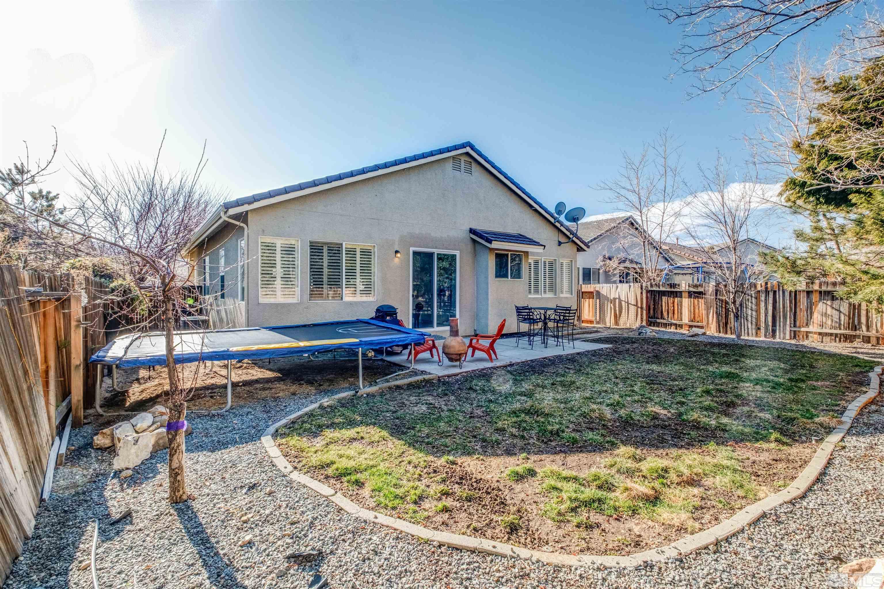 1651 Box Canyon Drive Reno, NV 89521 - Photo 21 of 40 a view of a house with backyard porch and sitting area
