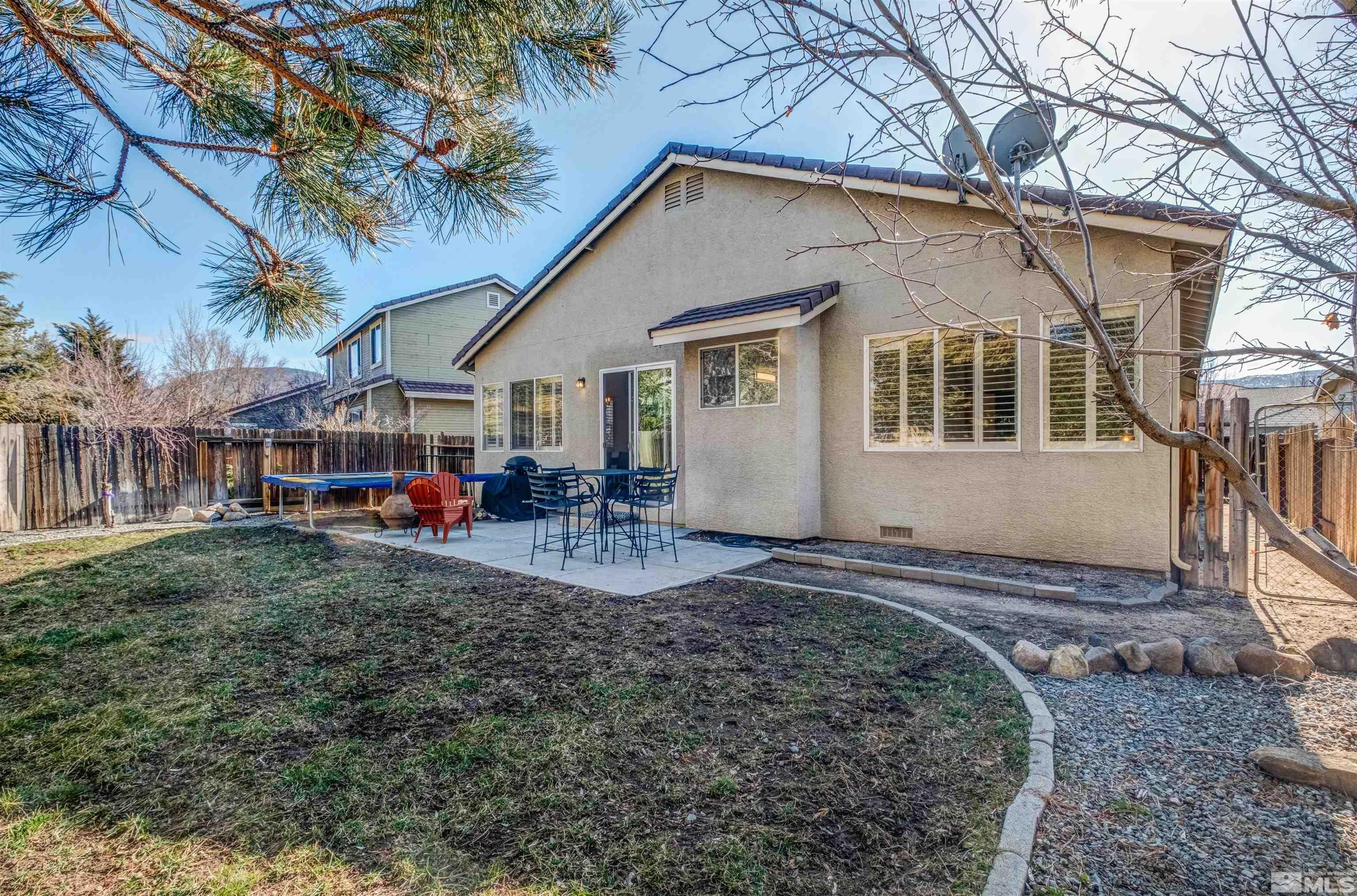 1651 Box Canyon Drive Reno, NV 89521 - Photo 22 of 40 a front view of a house with garden