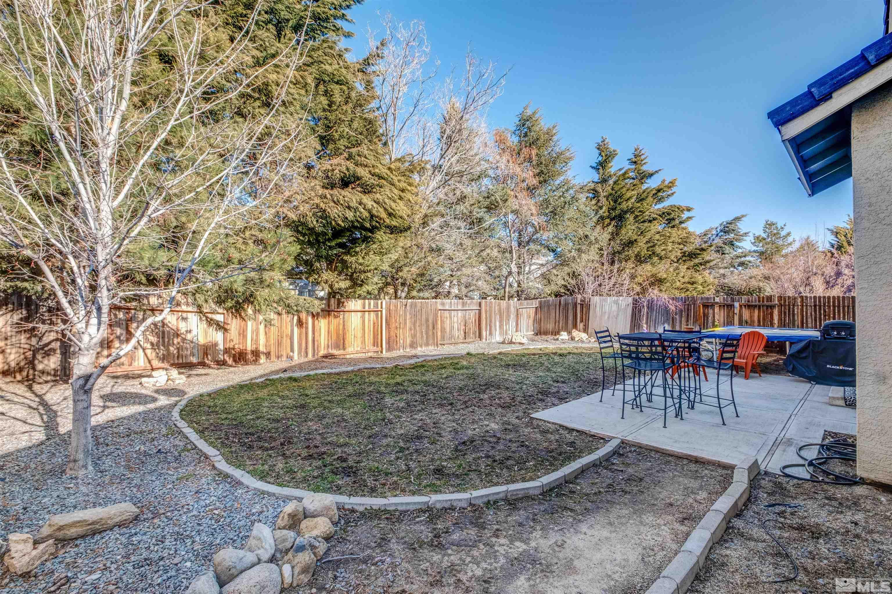 1651 Box Canyon Drive Reno, NV 89521 - Photo 24 of 40 a view of a backyard with a patio