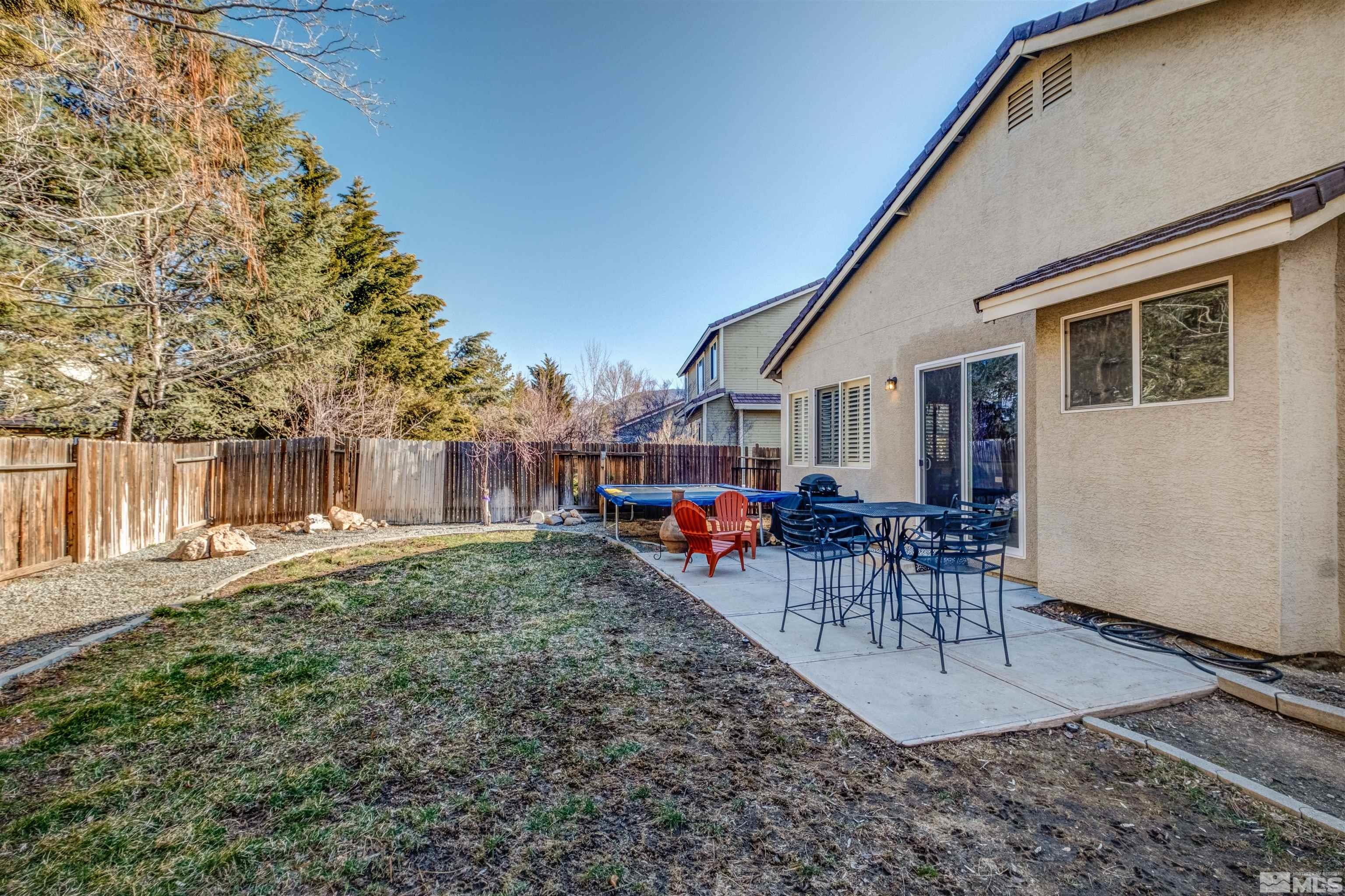 1651 Box Canyon Drive Reno, NV 89521 - Photo 25 of 40 a view of a backyard with a patio