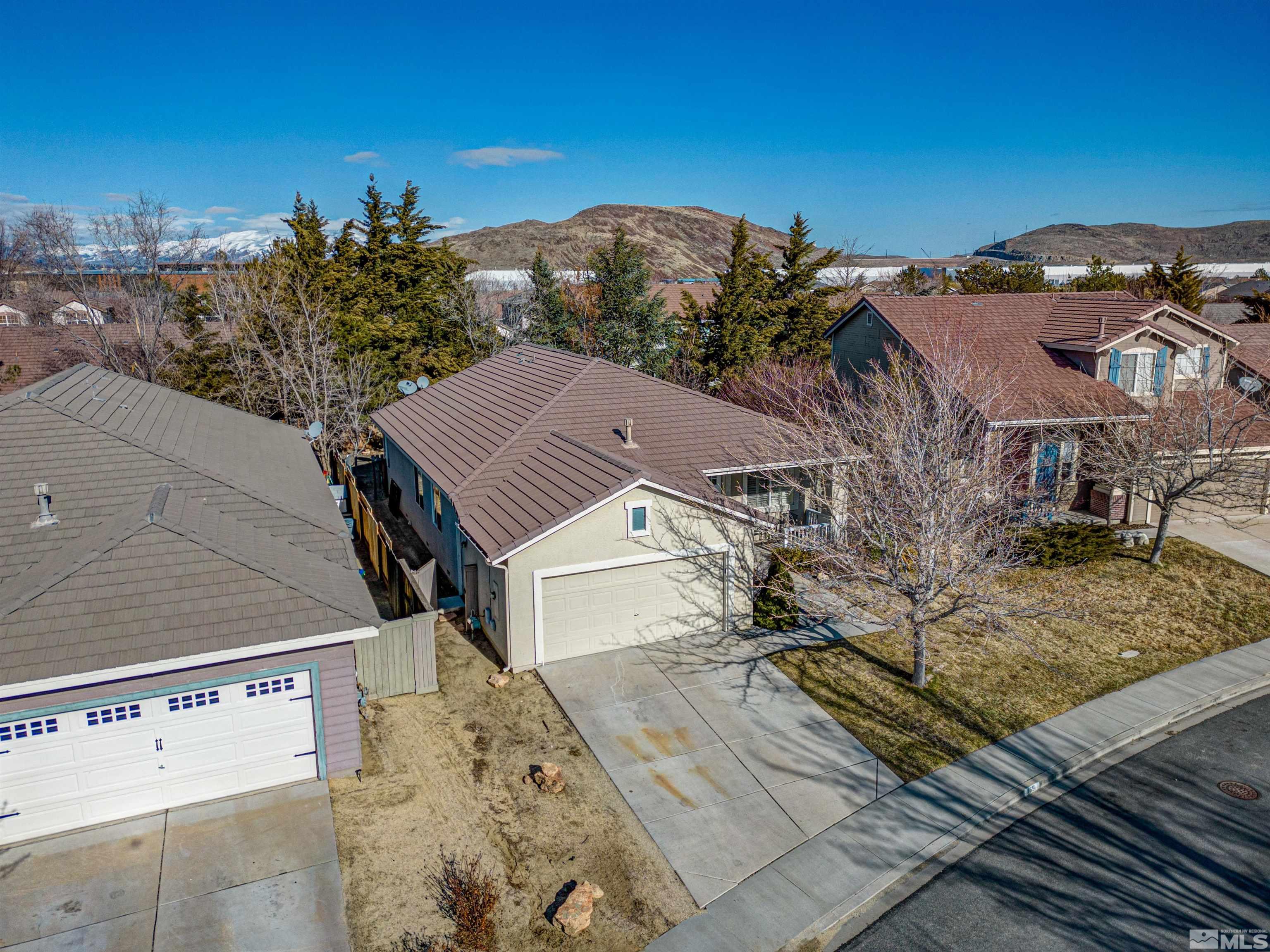 1651 Box Canyon Drive Reno, NV 89521 - Photo 26 of 40 a view of a house with a yard