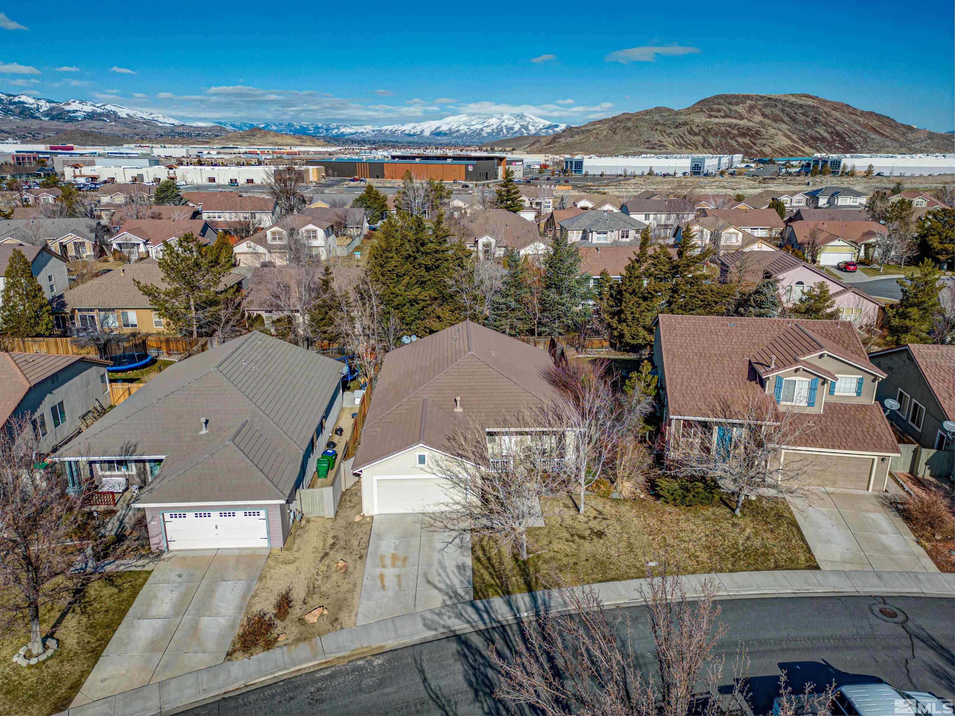 1651 Box Canyon Drive Reno, NV 89521 - Photo 28 of 40 an aerial view of residential houses with outdoor space and parking
