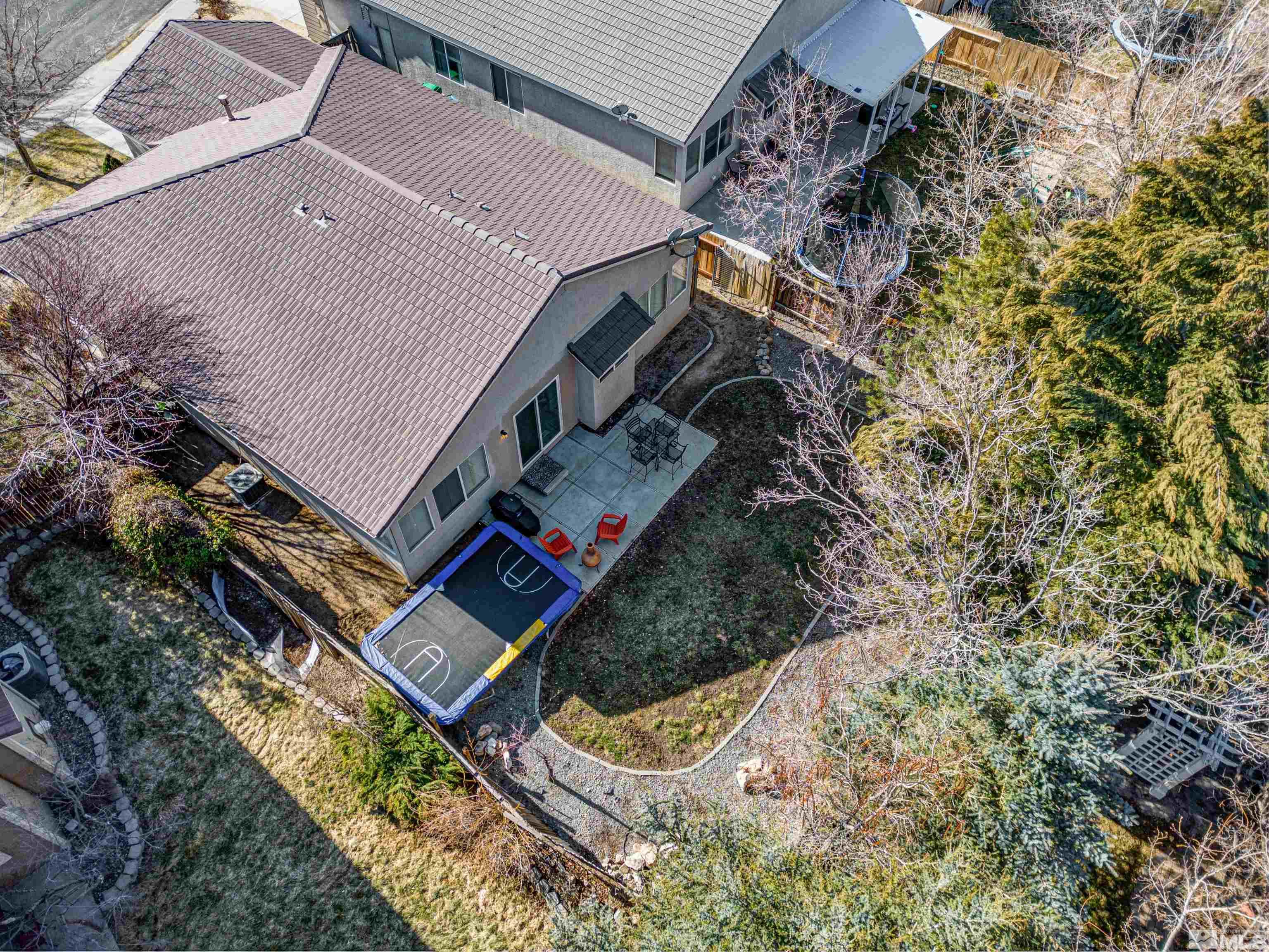 1651 Box Canyon Drive Reno, NV 89521 - Photo 31 of 40 an aerial view of a house with a yard and potted plants