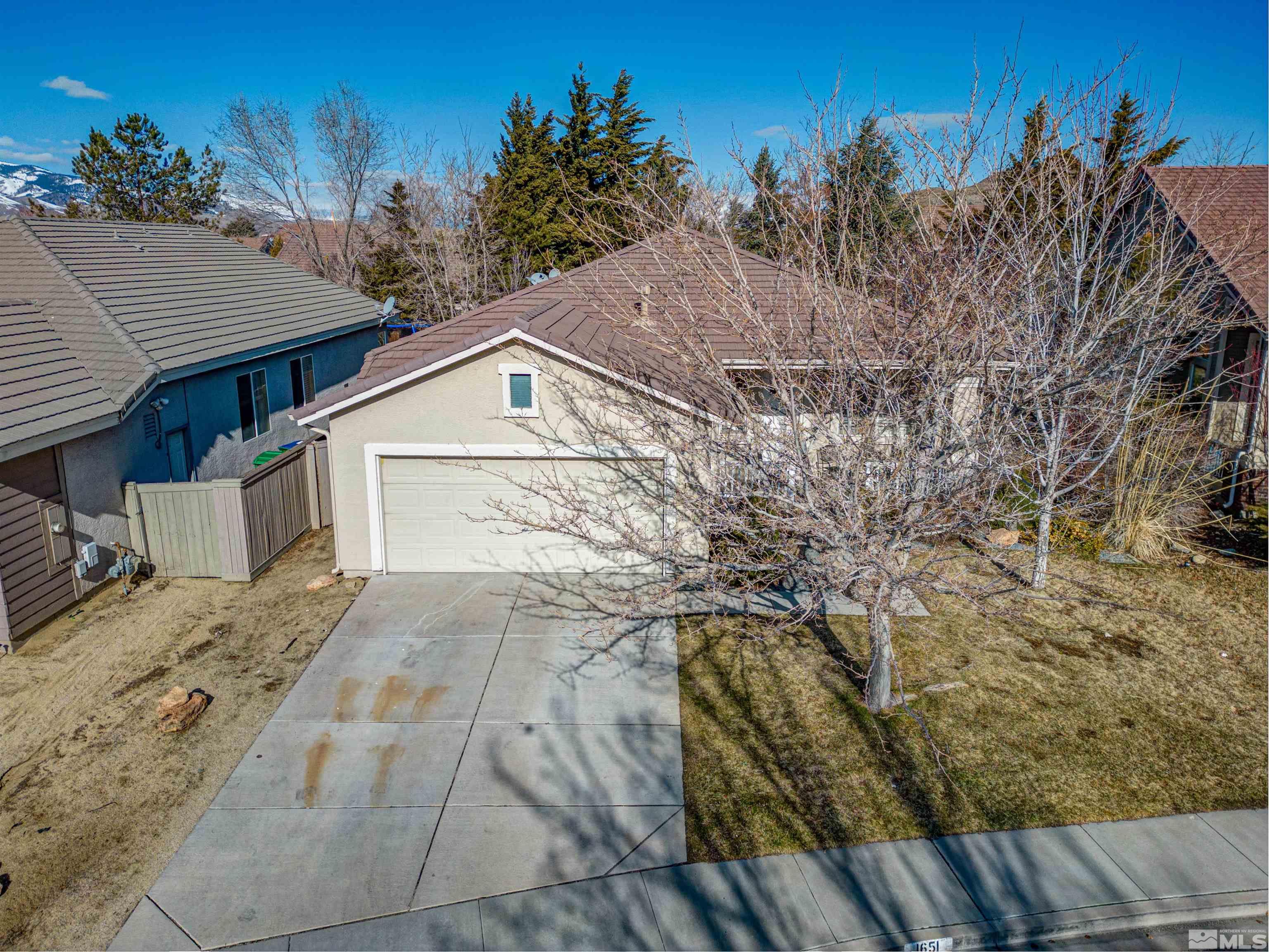 1651 Box Canyon Drive Reno, NV 89521 - Photo 38 of 40 a view of a house with a snow