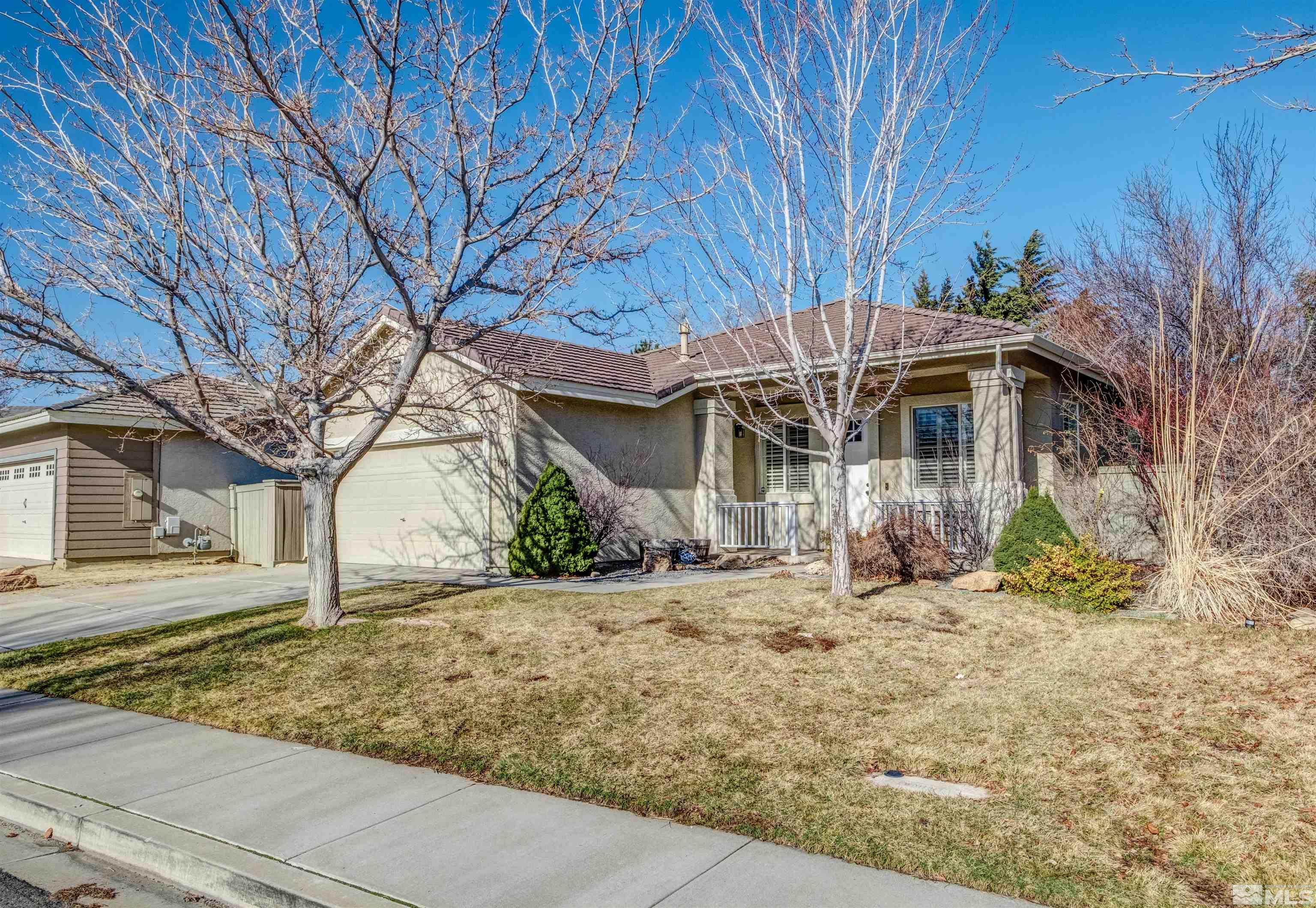 1651 Box Canyon Drive Reno, NV 89521 - Photo 40 of 40 a front view of a house with a yard