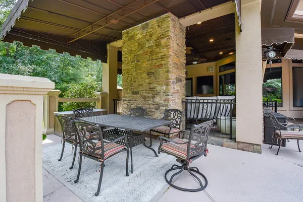 a view of a backyard with a patio