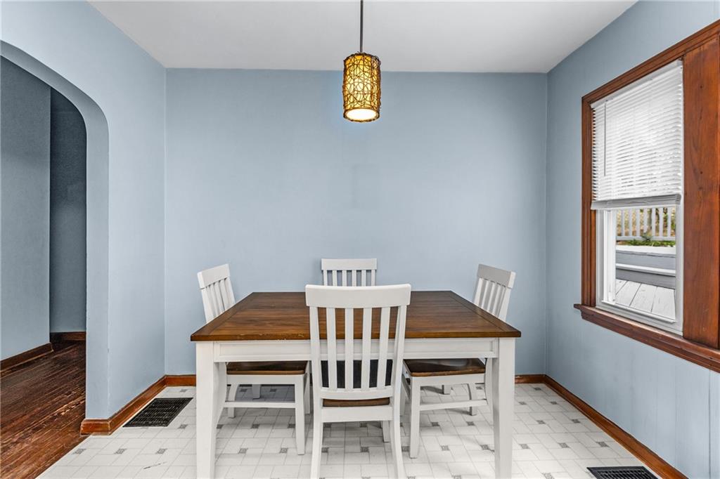 118 Oak Spring Road Canonsburg, PA 15317 - Photo 11 of 32 Charming dining area with a stylish light fixture and space for a family-sized table. Positioned by the window, it’s a perfect spot to enjoy daily meals.