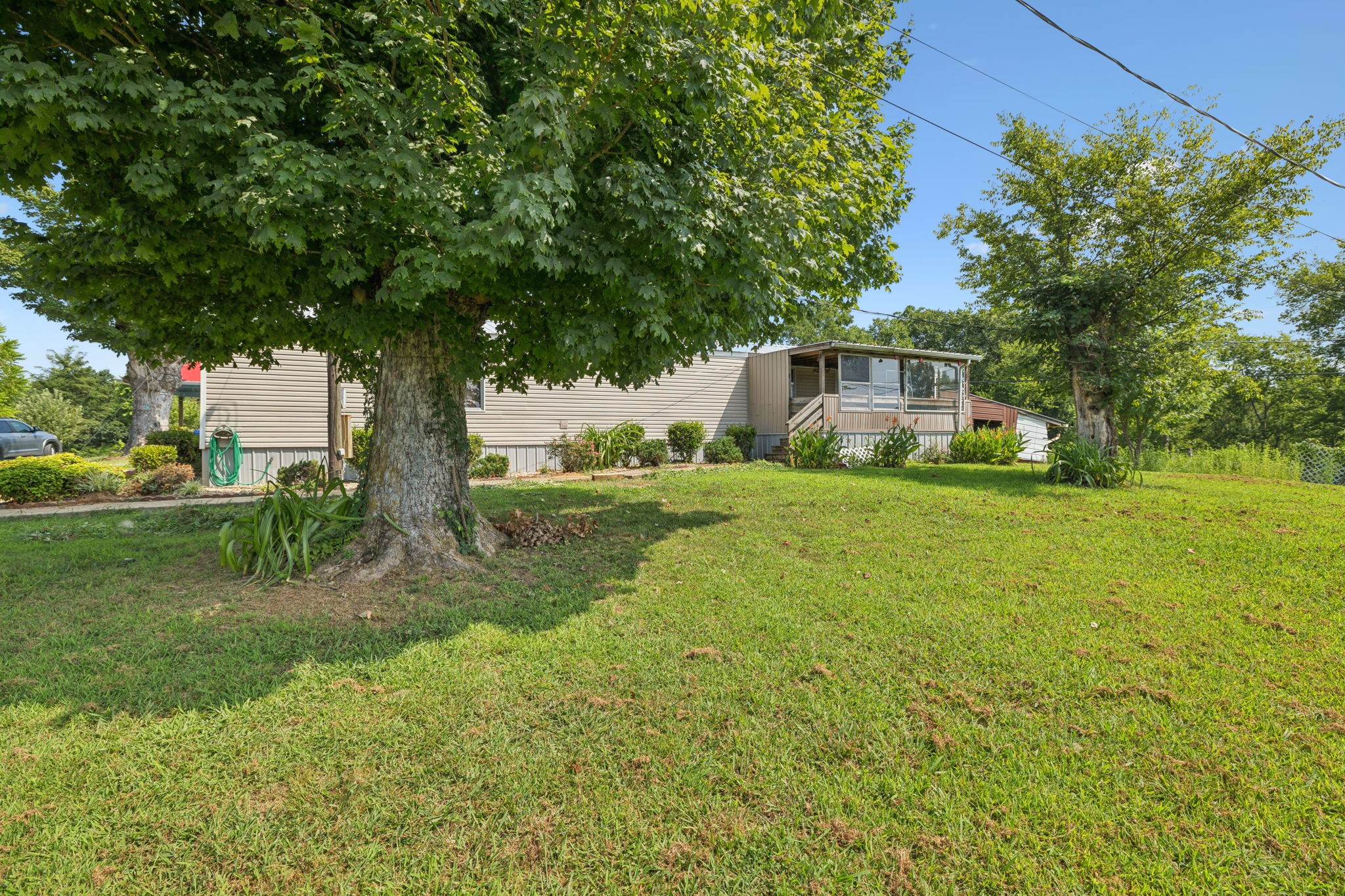 942 Fay Creek Road Wartrace, TN 37183 - Photo 16 of 68 a view of house with backyard