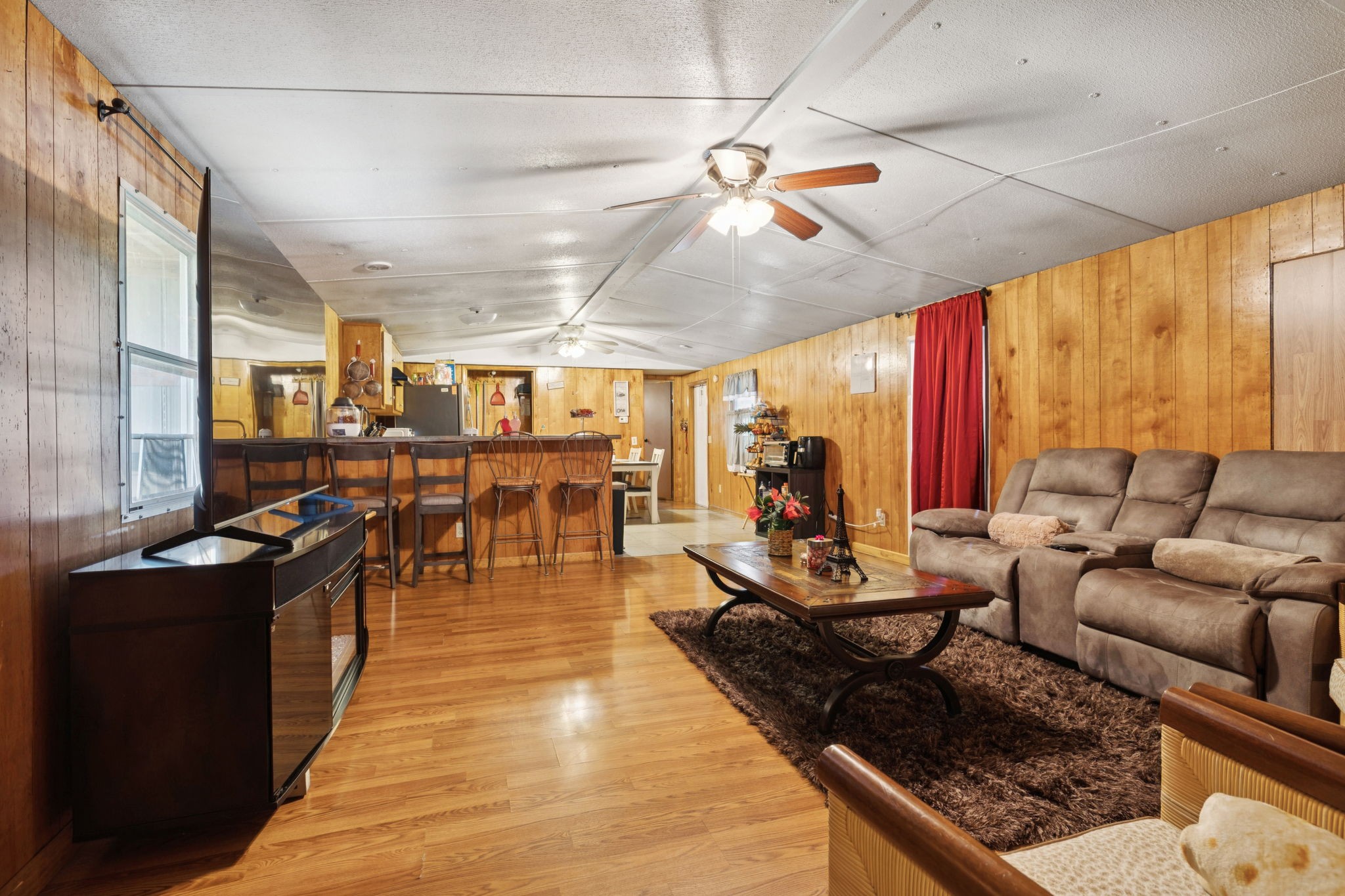 942 Fay Creek Road Wartrace, TN 37183 - Photo 27 of 68 a living room with lots of furniture and a large window