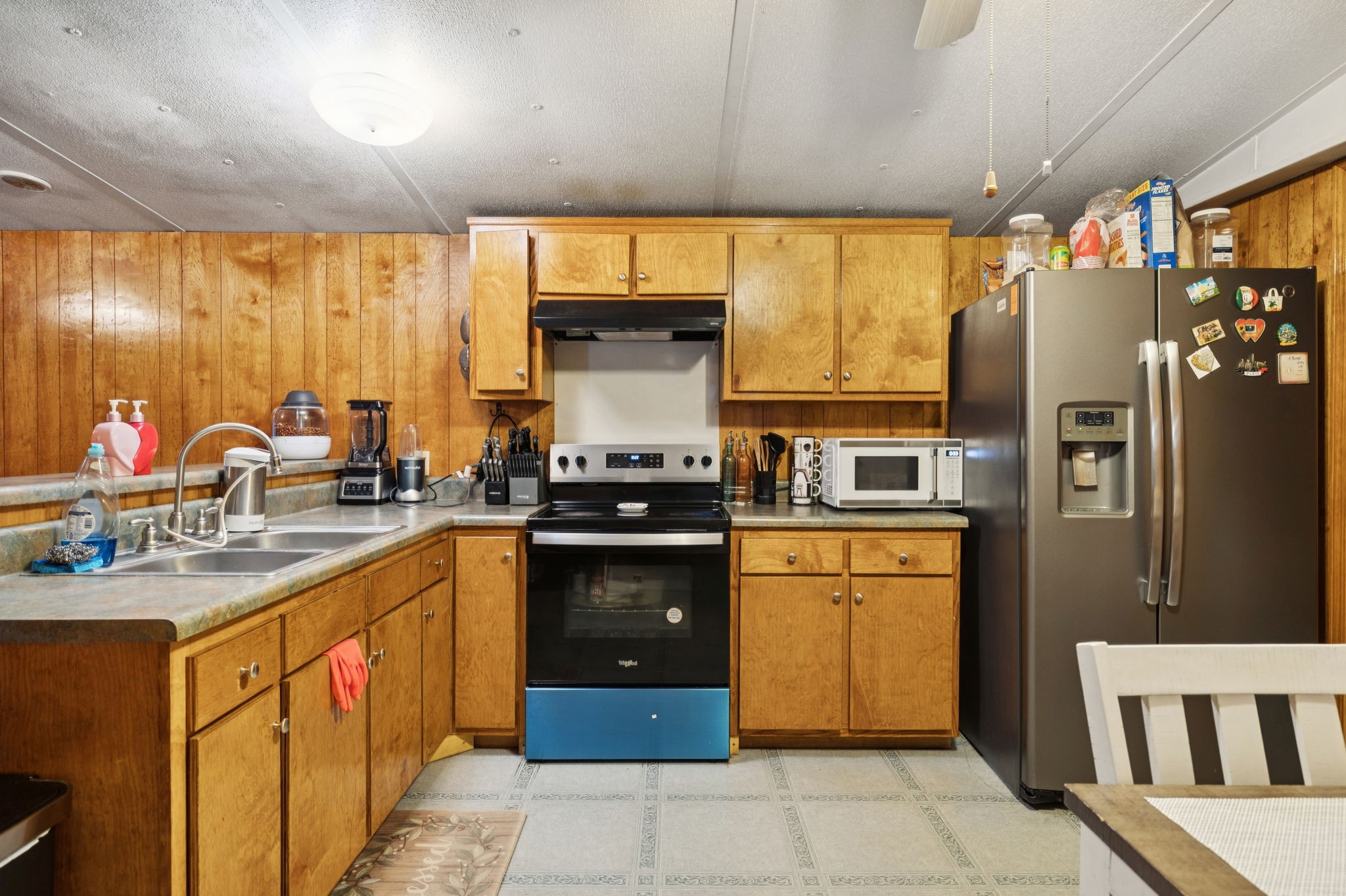 942 Fay Creek Road Wartrace, TN 37183 - Photo 30 of 68 a kitchen with stainless steel appliances granite countertop a refrigerator and a sink