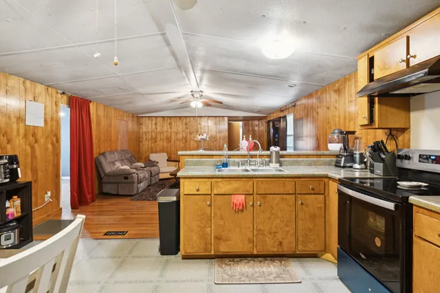 a view of room with furniture and a window