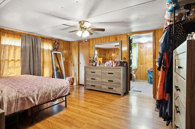 a living room with stainless steel appliances kitchen island granite countertop furniture and a kitchen view