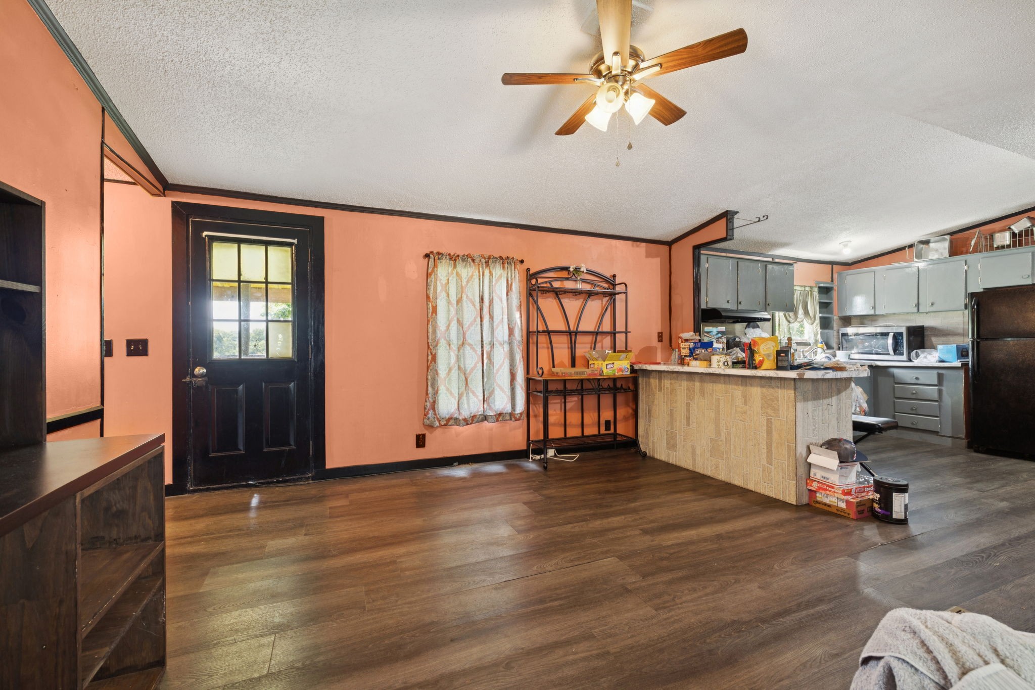 942 Fay Creek Road Wartrace, TN 37183 - Photo 44 of 68 a living room with stainless steel appliances kitchen island granite countertop furniture and a kitchen view