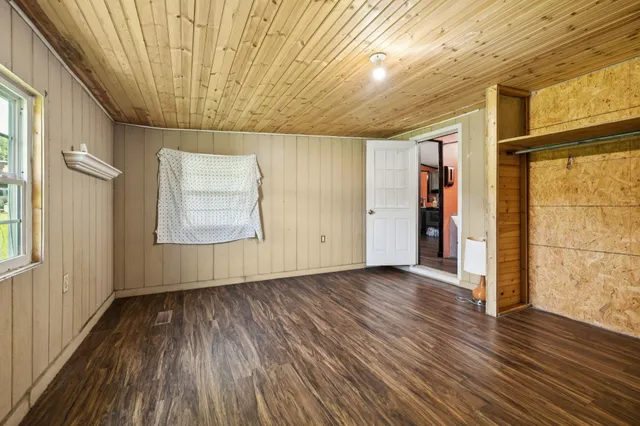 a room with furniture a washer and dryer