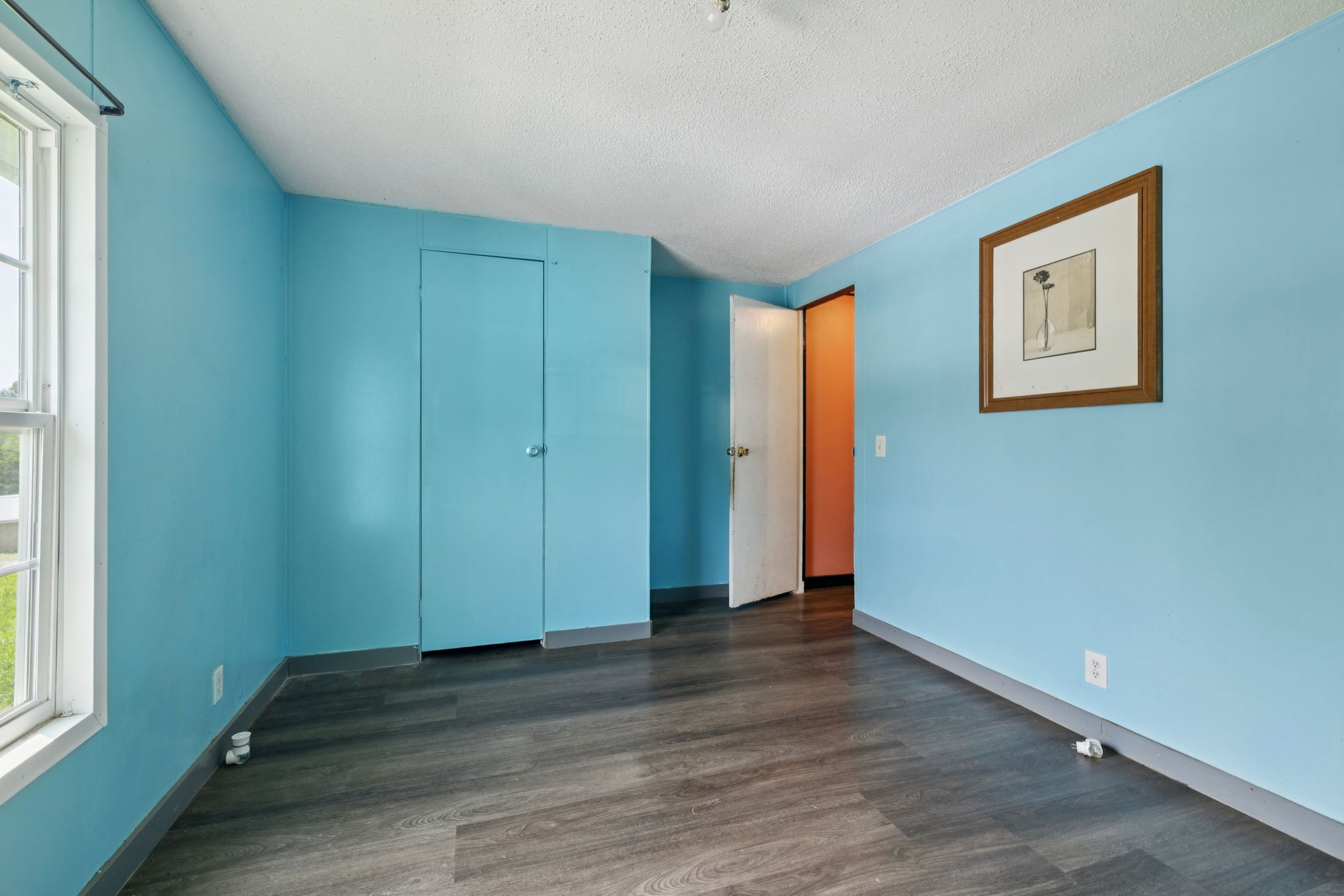 942 Fay Creek Road Wartrace, TN 37183 - Photo 52 of 68 an empty room with wooden floor and windows