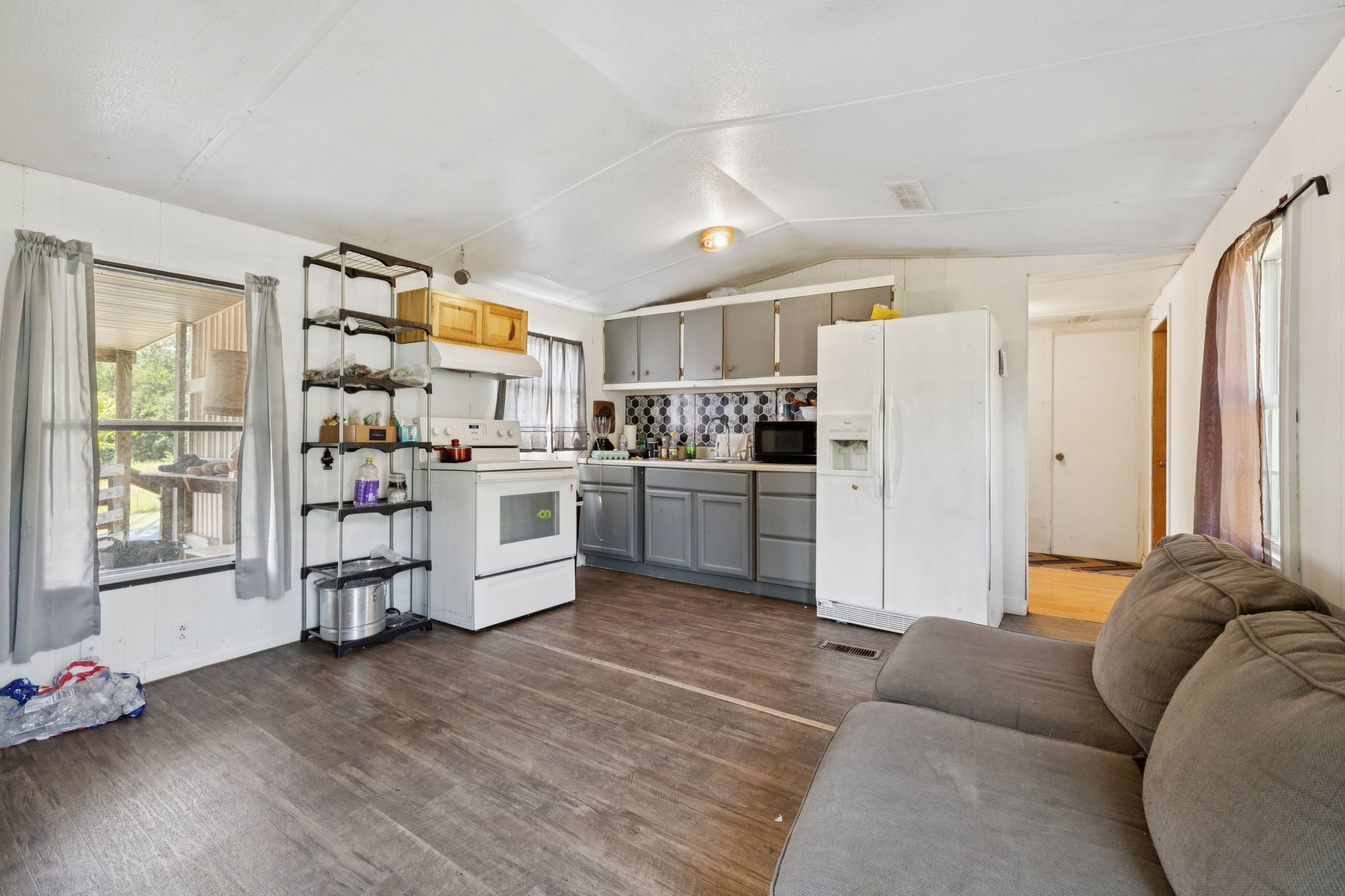 942 Fay Creek Road Wartrace, TN 37183 - Photo 56 of 68 a kitchen with stainless steel appliances a refrigerator and wooden floor