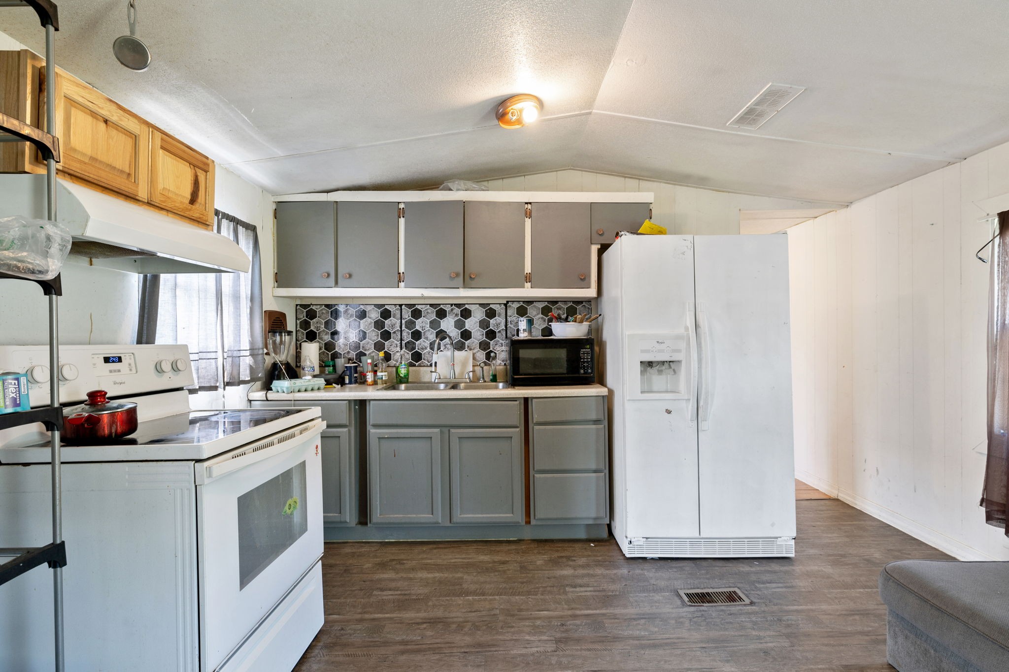 942 Fay Creek Road Wartrace, TN 37183 - Photo 58 of 68 a kitchen with stainless steel appliances granite countertop a stove and a refrigerator