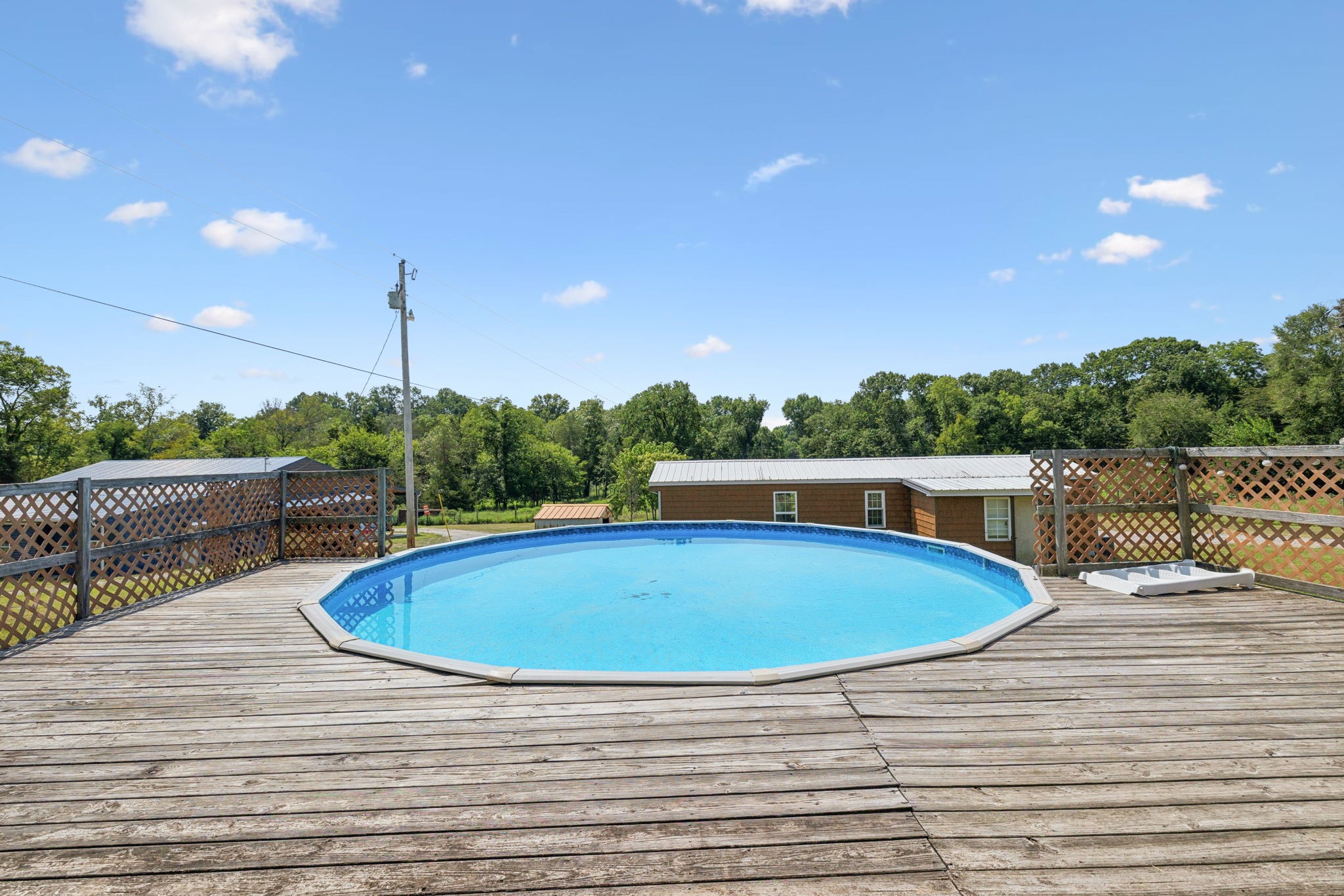 942 Fay Creek Road Wartrace, TN 37183 - Photo 8 of 68 a view of a swimming pool with a lake view and mountain view