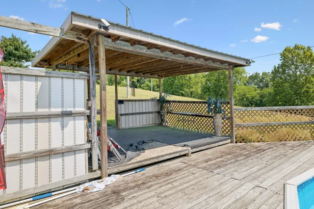 a view of house with backyard