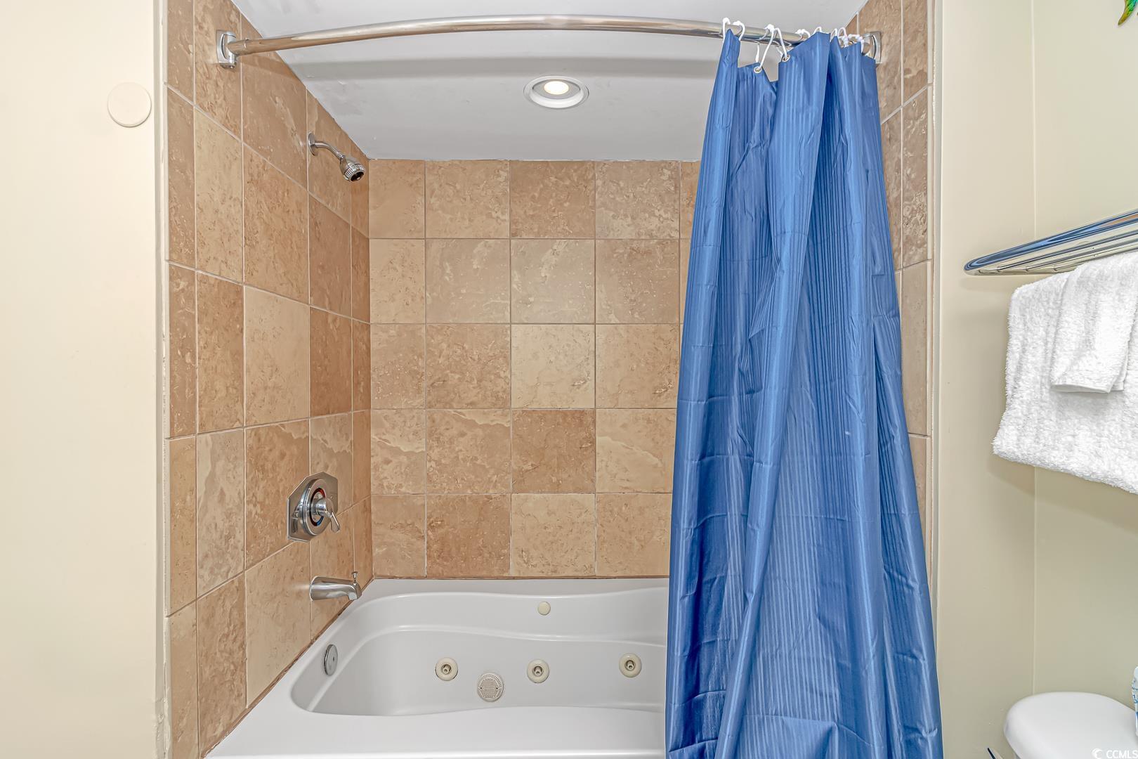 201 South Ocean Boulevard, Unit 1610 Myrtle Beach, SC 29577 - Photo 22 of 40 Full bathroom featuring a combined bath / shower with jetted tub and recessed lighting