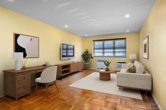 a living room with furniture and a window