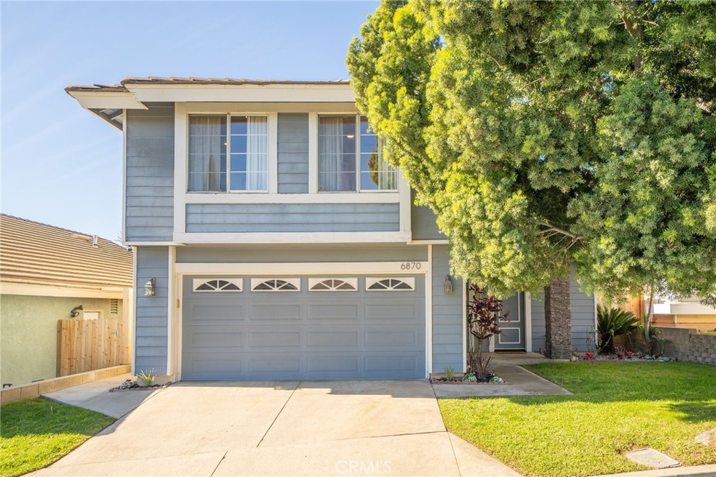 6870 Saddleback Place Rancho Cucamonga, CA 91701 - Photo 1 of 33 a front view of a house with a garden