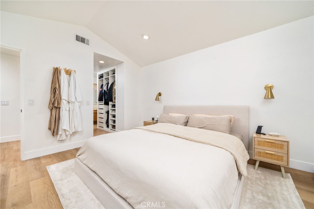 6870 Saddleback Place Rancho Cucamonga, CA 91701 - Photo 13 of 33 a bedroom with a bed and a view of bathroom