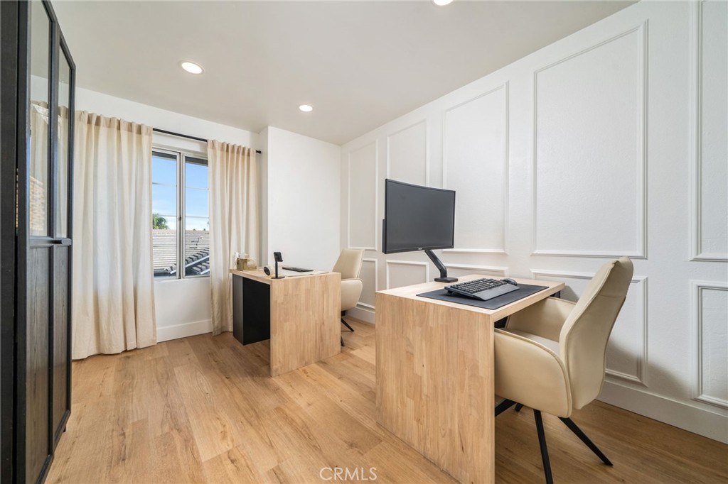 6870 Saddleback Place Rancho Cucamonga, CA 91701 - Photo 17 of 33 a view of a workspace with furniture and wooden floor