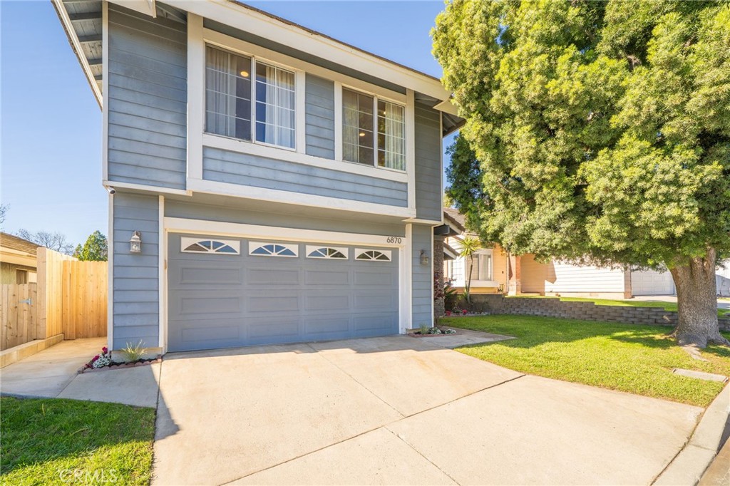 6870 Saddleback Place Rancho Cucamonga, CA 91701 - Photo 2 of 33 a front view of a house with garden