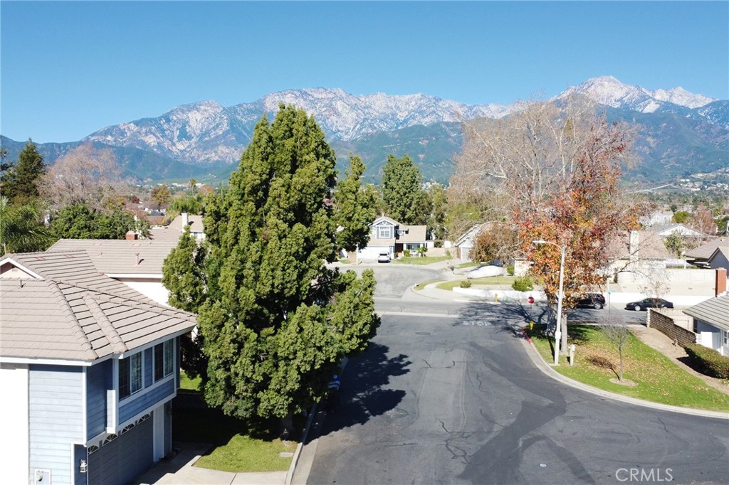 6870 Saddleback Place Rancho Cucamonga, CA 91701 - Photo 23 of 33 a view of a terrace with a garden and covered with snow