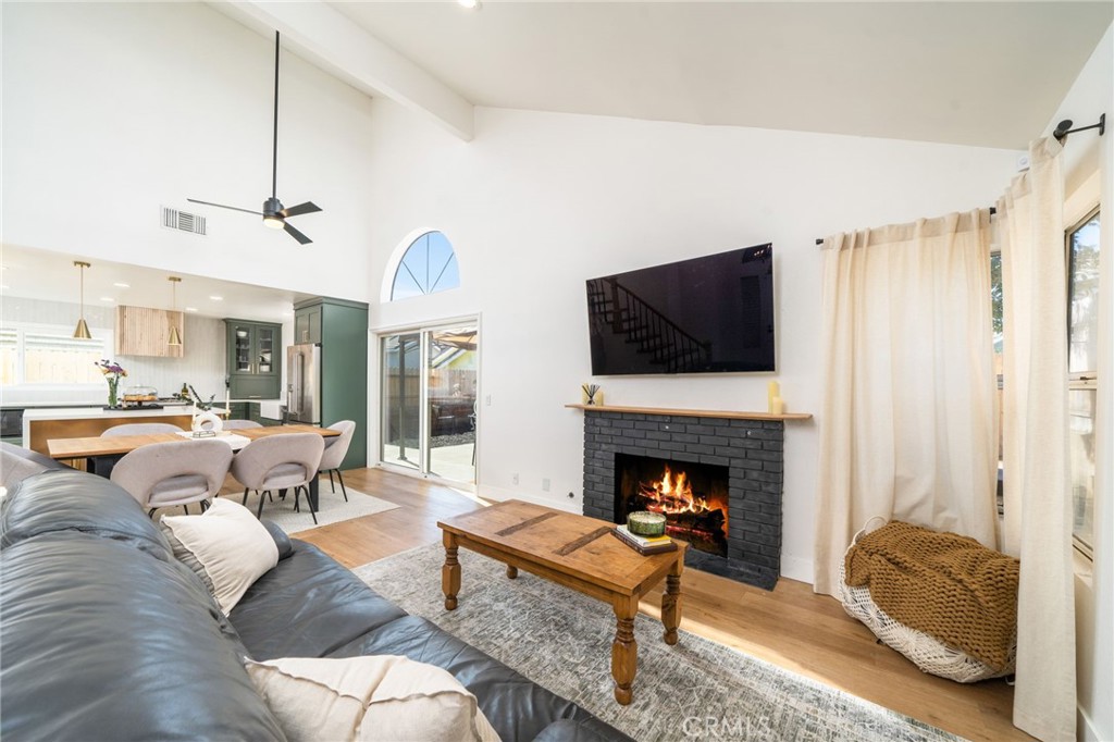 6870 Saddleback Place Rancho Cucamonga, CA 91701 - Photo 6 of 33 a living room with furniture fireplace and flat screen tv
