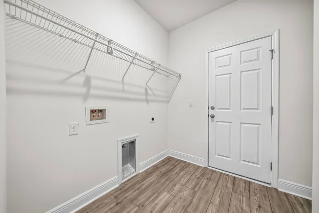 a view of room with hardwood floor