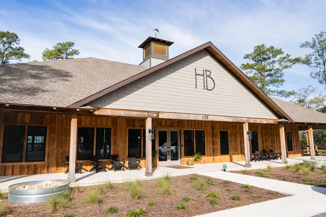 a view of a lake with wooden floor and lake