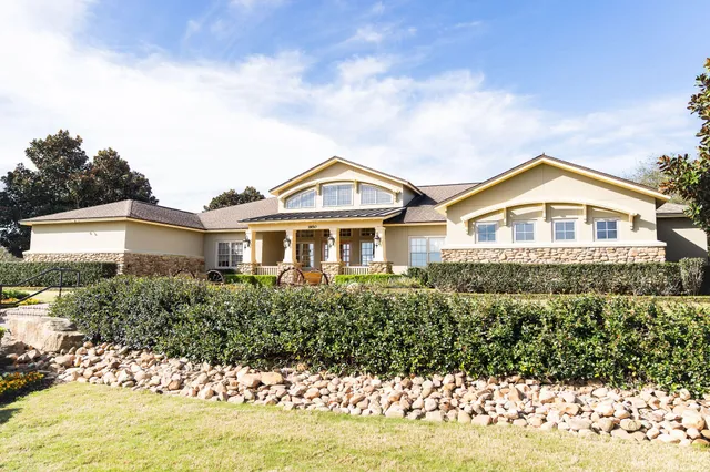 a view of a house with a swimming pool