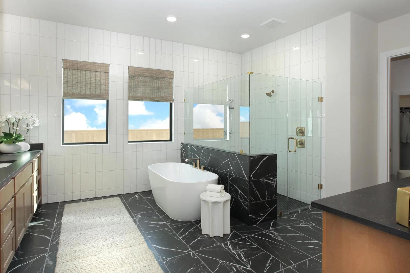 2033 Morning Mist Drive Georgetown, TX 78628 - Photo 25 of 36 a spacious bathroom with a double vanity sink and a mirror