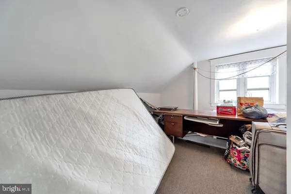 a room with a bed and a table