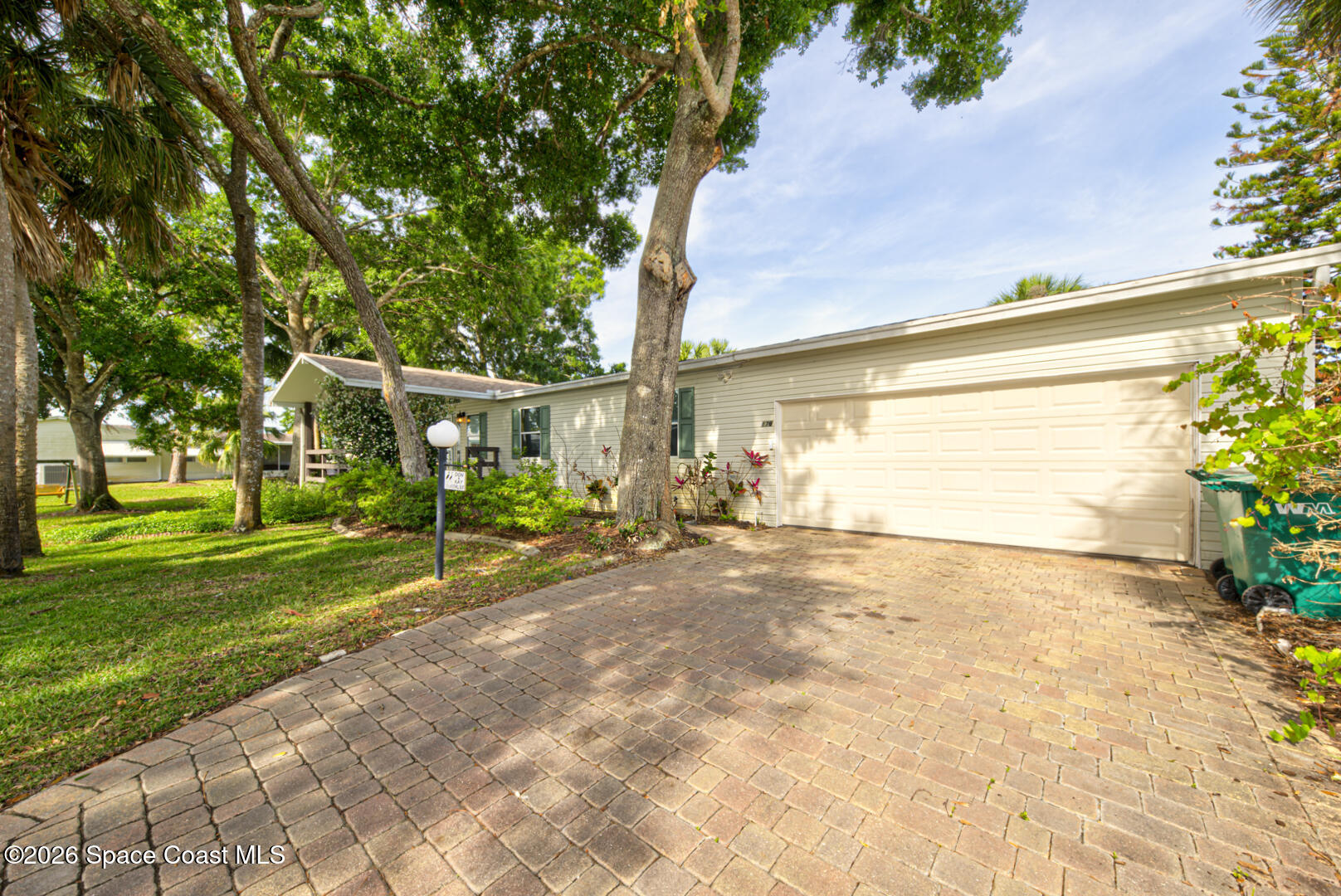 176 Woodsmill Boulevard, Unit 177 Cocoa, FL 32926 - Photo 5 of 63 2 front of house right