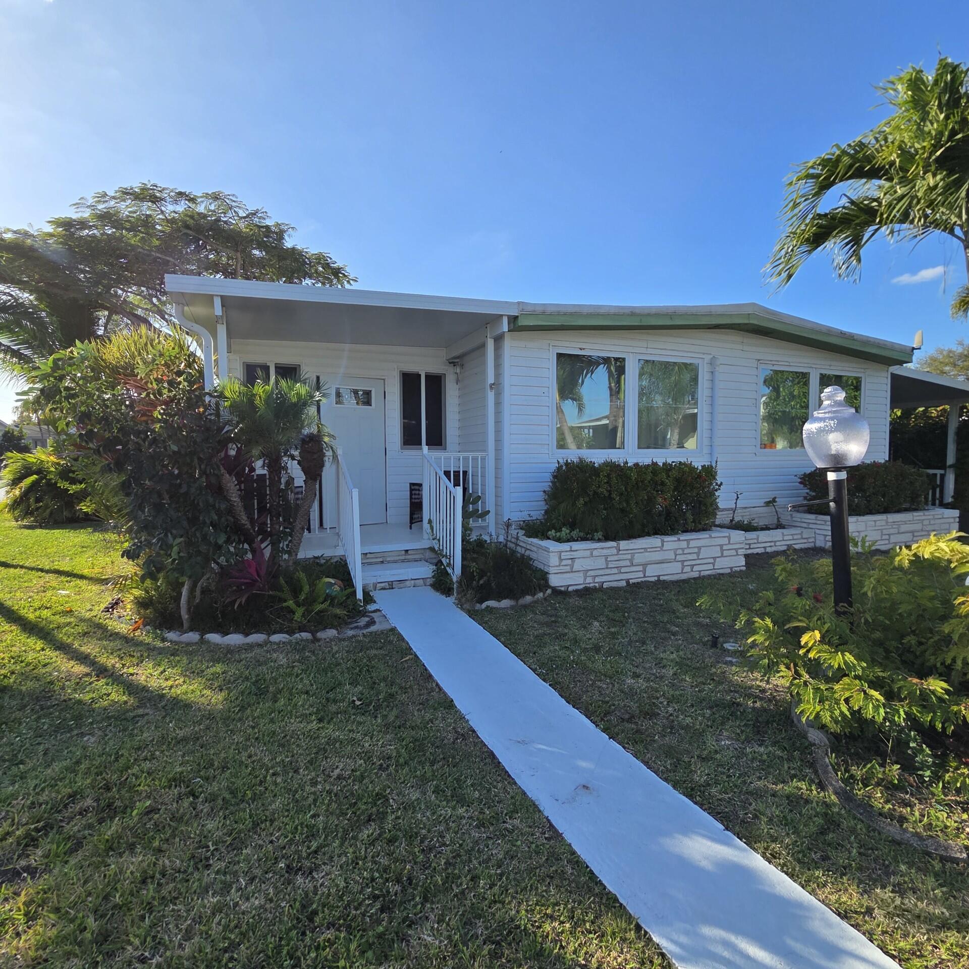 4501 Northwest 68th Street Coconut Creek, FL 33073 - Photo 1 of 44 Front