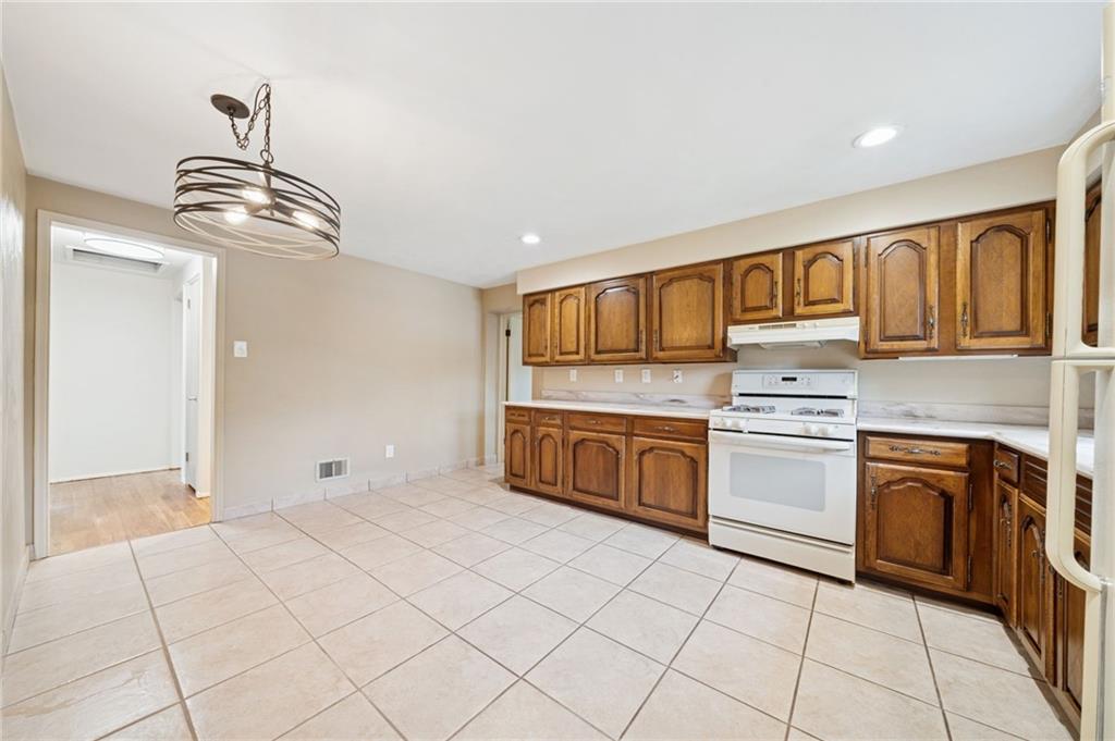 988 Shadycrest Road Pittsburgh, PA 15216 - Photo 7 of 35 An addition to the original home enlarged the kitchen into a spacious Eat in kitchen with lots of counter space and cabinetry. The counters are 2020.